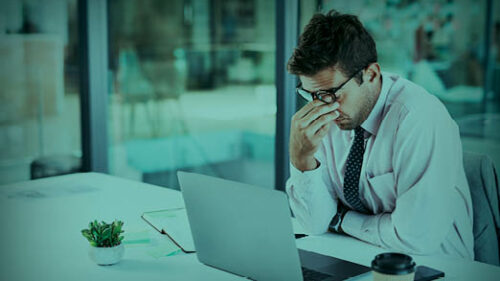 an employee battling burnout