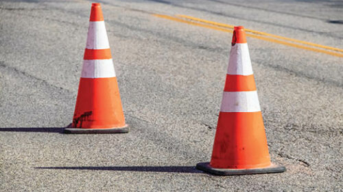 Two traffic cones on a road