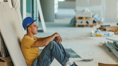 construction worker sitting down