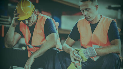 two construction workers thinking about their mental wellbeing