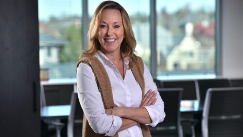 Dr. Lori Hart wearing professional clothes smiling for a professional photo.