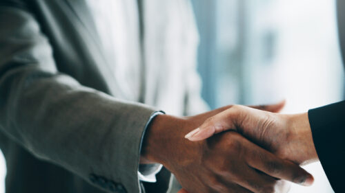 Two people shaking hands