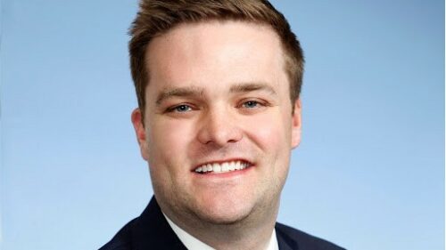 Ted Holt smiling in a professional headshot photo